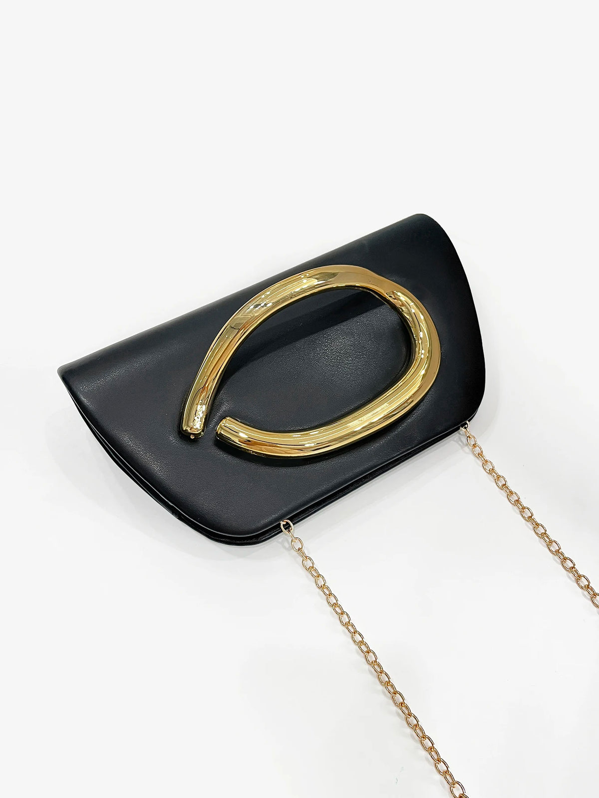 Clutch con Asa Dorada