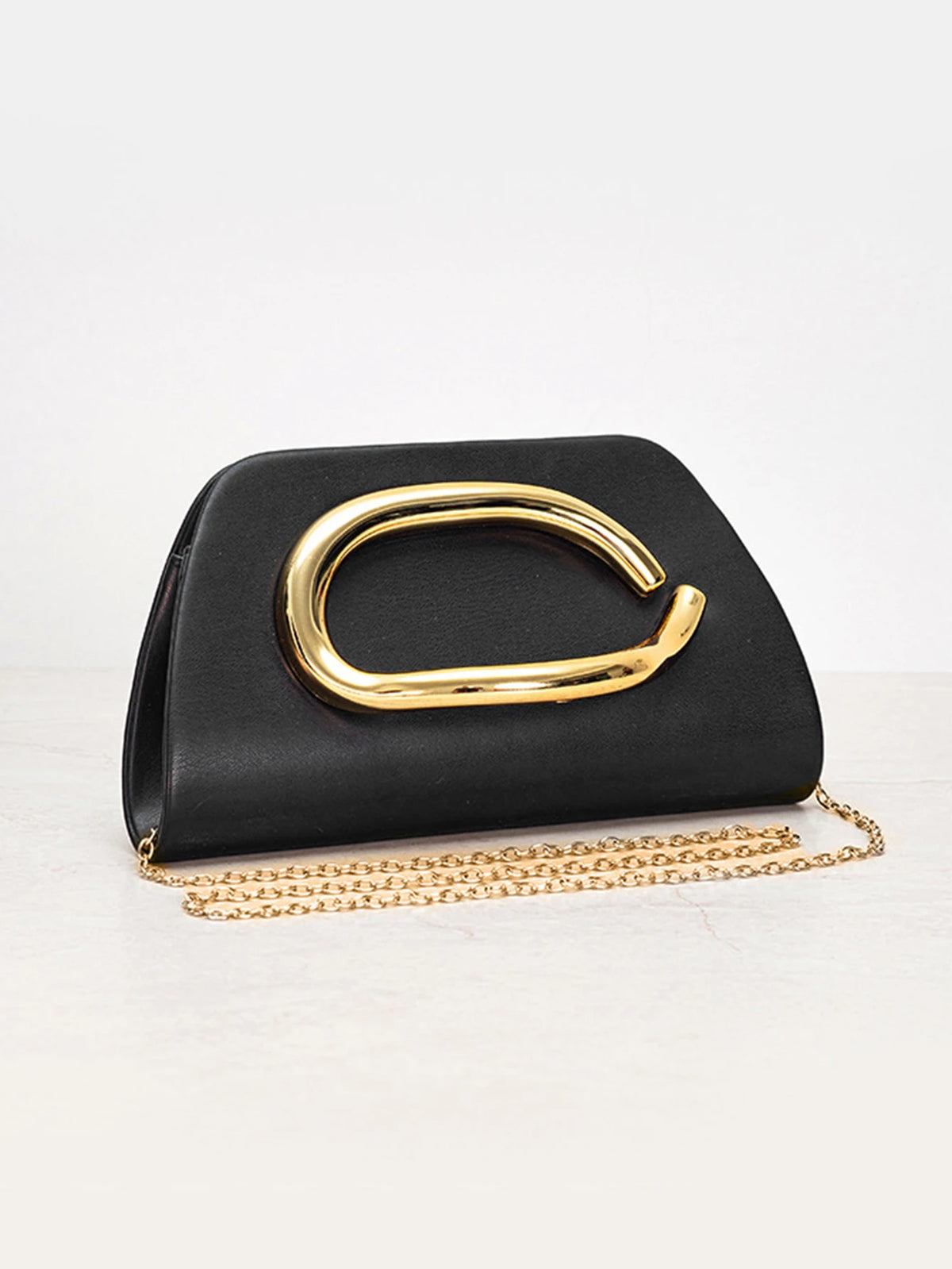 Clutch con Asa Dorada